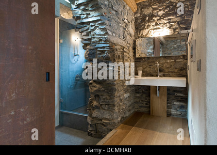 modern, contemporary bathroom in rustic home Stock Photo