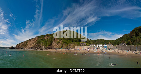 Horizontal panoramic view across Polkerris beach on a beautiful summer's day. Stock Photo