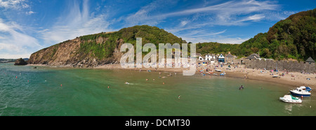 Horizontal panoramic view across Polkerris beach on a beautiful summer's day. Stock Photo