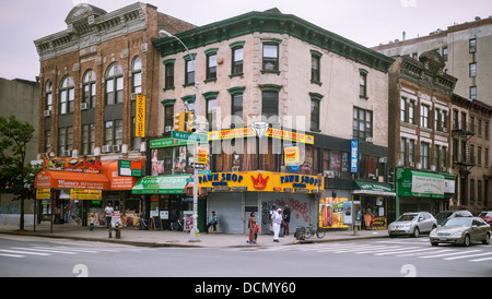 A street corner on East 125th Street in Harlem in New York is ripe for development Stock Photo