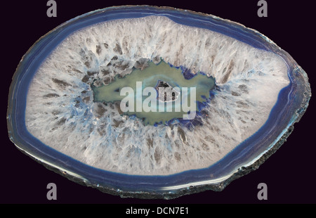 cross section of blue agate isolated on black background Stock Photo