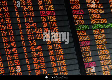 Electronic flights schedule - arrivals and departures information in international airport Stock Photo