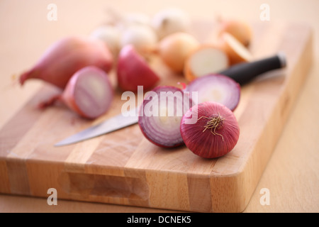 Premium Photo  Shallots or red onion purple shallots on wooden background  fresh shallot for medicinal products or herbs and spices thai food made  from this raw shallot