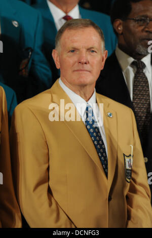 Coach of the Miami Dolphins' perfect season, Don Shula, with quarterback  Bob Griese during a halftime ceremony celebrating the undefeated 1972 team  as the Dolphins play host to the Cincinnati Bengals on