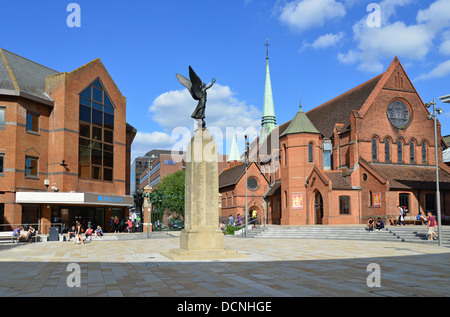 Woking Town Square showing War Memorial and Christ Church, Woking, Surrey, England, United Kingdom Stock Photo