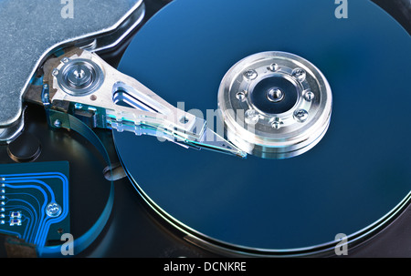 Opened Hard disk drive toned in blue Stock Photo