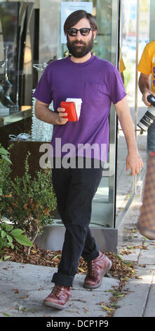 Jason Schwartzman leaves Le Pain Quotidien after having lunch with his wife Brady Cunningham and their daughter Marlowe Los Angeles, California - 28.10.11 Stock Photo