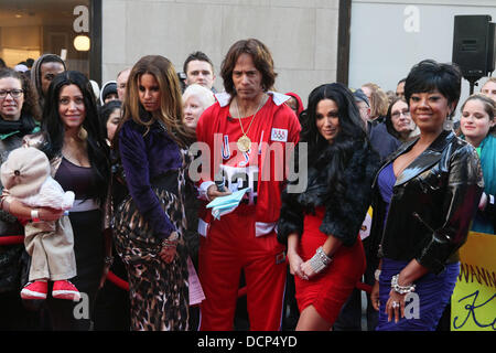 (L-R) Melissa Francis, Jenna Wolfe, Lester Holt, Amy Robach and Janice Huff as the Kardashians filming for the NBC Today Show at Rockefeller Center for Halloween New York City, USA - 30.10.11 Stock Photo