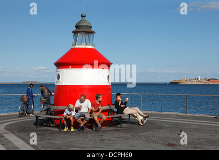 Popular ice creams on a sunny and warm summer day at the outermost of the Langelinie pier, the Langelinie pier head at the red lighthouse. Copenhagen. Stock Photo