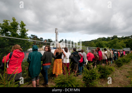 Site of Cuadrilla drilling. Demonstration against fracking .  Protesters surround the  drilling rig and hold hands. Stock Photo