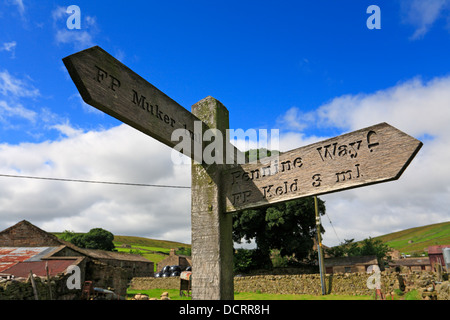 Pennine Way footpath sign post in Thwaite, Swaledale, North Yorkshire, Yorkshire Dales National Park, England, UK. Stock Photo