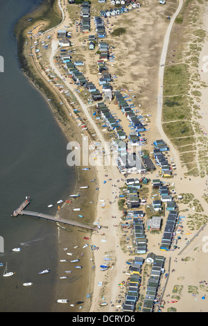 Aerial photograph of beach huts and people on the beach at Hengistbury Head, Christchurch Dorset Stock Photo