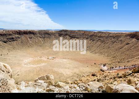 Tourists on the Rim overlook, Meteor Crater (also known as Barringer Crater) near Winslow, Arizona, USA Stock Photo