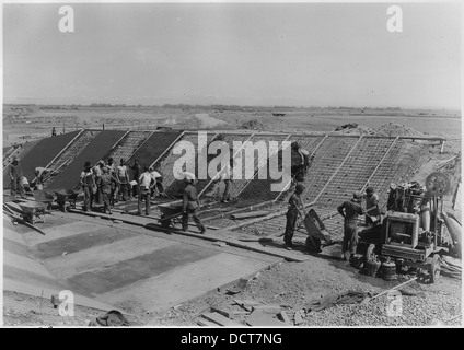 CCC Camp BR-72 Shoshone Project, Photograph showing enrollees mixing, placing and finishing concrete in the upper... - - 293553 Stock Photo