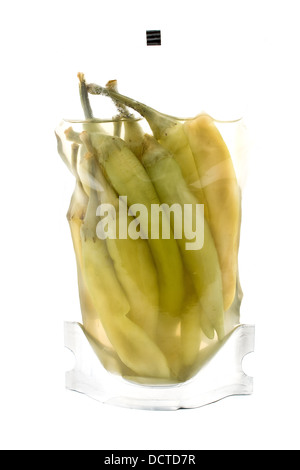 Hot chili peppers in plastic packaging on white Stock Photo