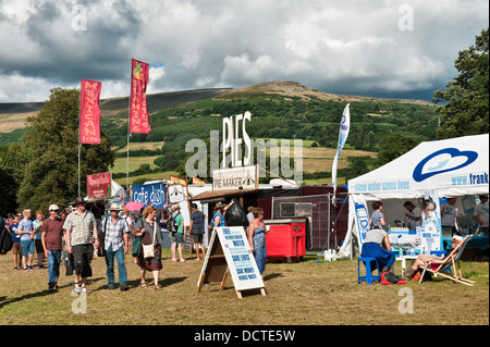 Food stalls against a backdrop of the Black Mountains, at the annual Green Man music festival, Glanusk, Crickhowell, Wales, UK Stock Photo