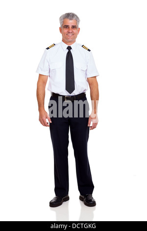 smiling senior airline pilot standing on white background