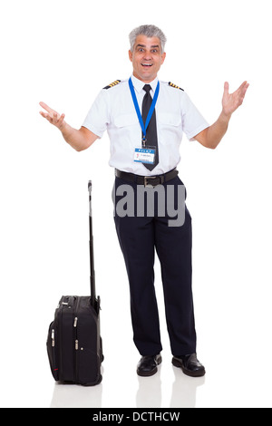 senior airline captain with surprised facial expression on white background Stock Photo