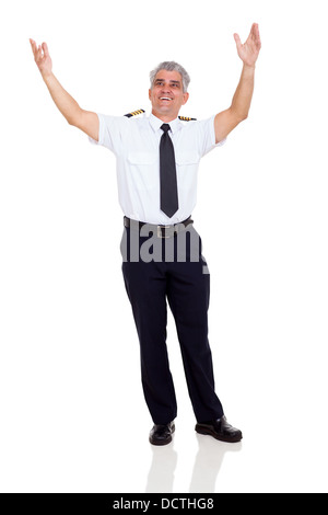 cheerful senior commercial airline pilot arms up