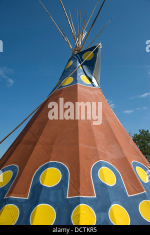 PAINTED NATIVE AMERICAN TEEPEE SAINT MARY LODGE RESORT SAINT MARYS GLACIER NATIONAL PARK MONTANA USA Stock Photo