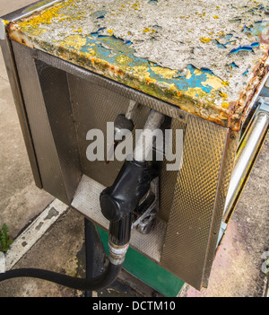 petrol pump with signs of bad decay Stock Photo