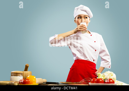 asian cook drink milk Stock Photo - Alamy