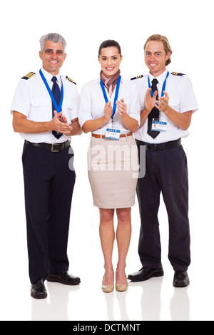 group of happy airline crew applauding isolated on white Stock Photo