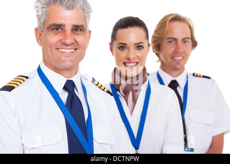 smiling middle aged pilot and crew isolated on white Stock Photo