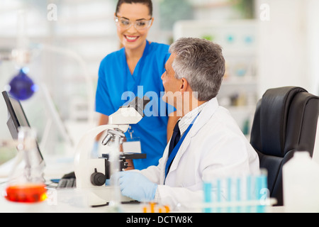 two scientists working in a lab Stock Photo