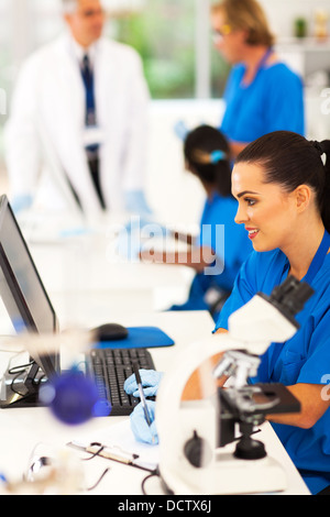 group of lab technicians working in a modern laboratory Stock Photo
