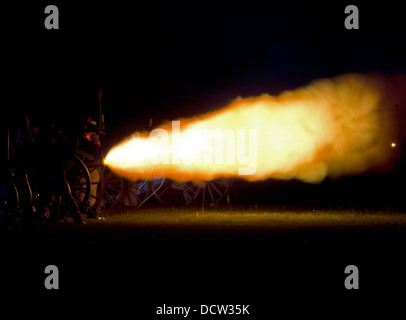 The cannon roars during the re enactment of the night bombardment of the Battle of Fort George. Stock Photo