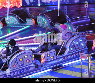 X Factor contestants Marcus Collins, Misha B and Amelia Lily   enjoy a night out at Winter Wonderland.  London, England - 24.11.11 Stock Photo