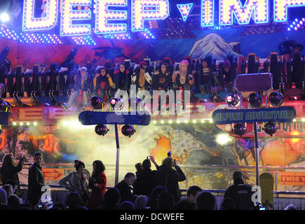 X Factor contestants Perrie Edwards, Jade Thirlwall, Leigh-Anne Pinnock and Jesy Nelson of Little Mix enjoy a night out at Winter Wonderland with mentor Tulisa Contostavlos and fellow contestants Amelia Lily, Marcus Collins and Misha B.  London, England - Stock Photo