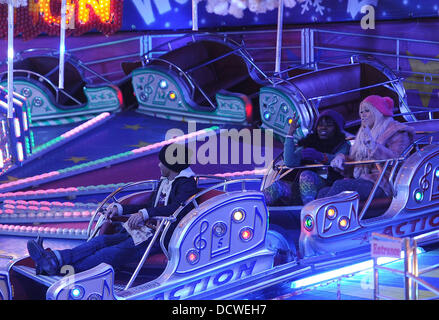 X Factor contestants Marcus Collins, Amelia Lily and Misha B  enjoy a night out at Winter Wonderland.  London, England - 24.11.11 Stock Photo