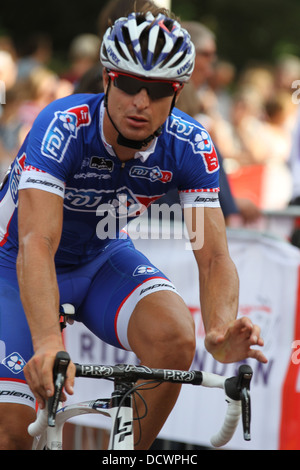 Bike rider of FDJ.fr of France at the finish of the 2013 Prudential RideLondon-Surrey Classic cycling event. Stock Photo