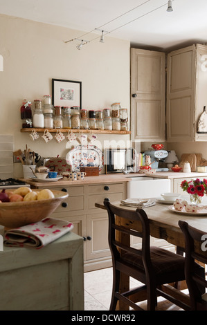 Reclaimed wooden units in Bristol home of British fabric designer Emily Bond Stock Photo