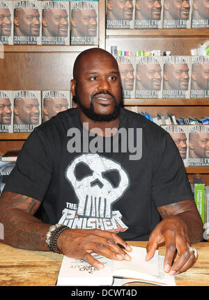 Shaquille O'Neal greets fans and signs copies of his book 'Shaq Uncut' at Books and Books Coral Gables, Florida - 05.12.11 Stock Photo