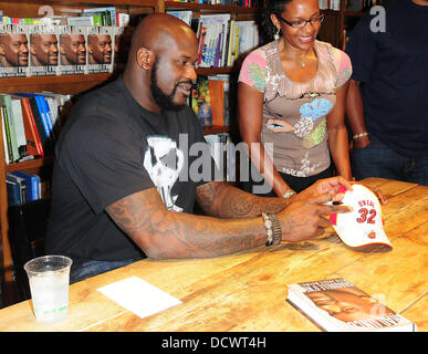 Shaquille O'Neal greets fans and signs copies of his book 'Shaq Uncut' at Books and Books Coral Gables, Florida - 05.12.11 Stock Photo