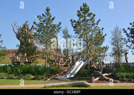 Slides & kids climbing play area at Tumbling Bay Playground in the reopened parkland areas of the Queen Elizabeth Olympic Park Stock Photo