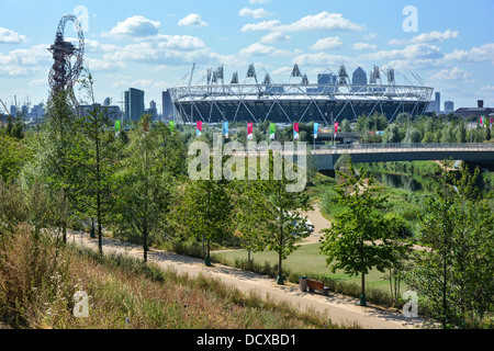 Queen Elizabeth Olympic Park reopened legacy parkland leisure areas with the Orbit Tower & London 2012 Olympic stadium beyond East London England UK Stock Photo