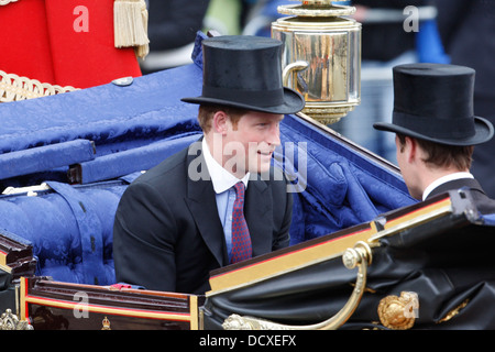 Prince Harry and Prince William Duke of Cambridge are seen during the Carriage Procession from Westminster Hall to Buckingham Stock Photo