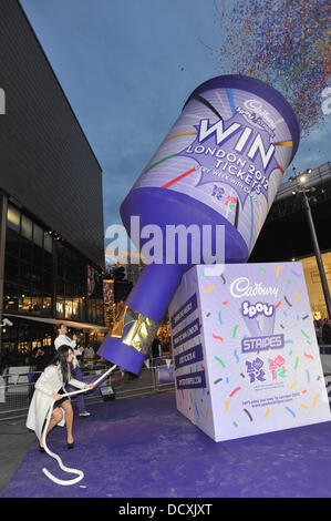 Christine Bleakley pops a giant Cadbury Party Popper full of Olympic and Paralympics tickets at Westfield Stratford. London, England - 20.12.11 Stock Photo