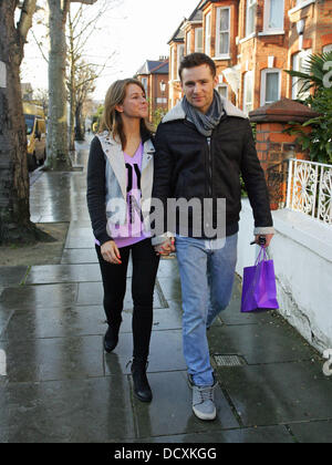 Harry Judd and girlfriend Izzy Johnston  leaving Fearne Cotton's house after her Christmas Party London, England - 22.12.11 Stock Photo