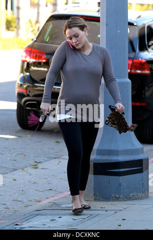 Pregnant Hilary Duff  shows off her bump, while out Christmas shopping in Studio City Los Angeles, California - 22.12.11 Stock Photo
