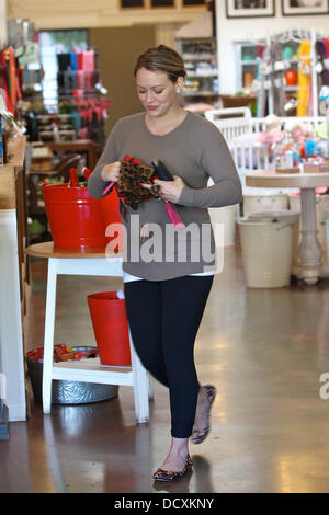 Pregnant Hilary Duff  shows off her bump, while out Christmas shopping in Studio City Los Angeles, California - 22.12.11 Stock Photo