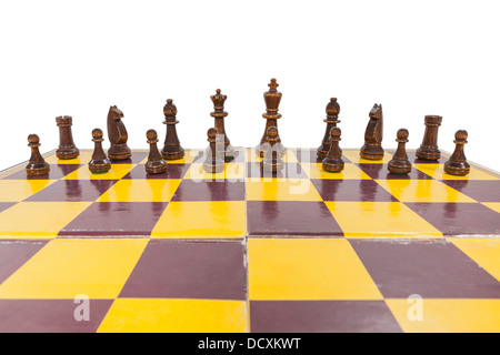 Vintage chess board with black side lined up. Stock Photo