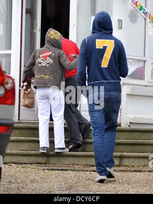 Sinead O'Connor returning to her home in Bray, Co. Wicklow this afternoon on crutches and being shielded by her daughter Roisin from being photographed. She earlier tweeted to her followers for help to find a Psychiatrist as she claimed she was in serious danger and needed to get back on her Meds. She then tweeted that she was on her way to hospital because she thought she had brok Stock Photo