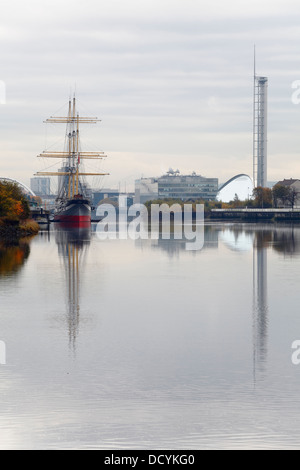 View up the River Clyde in autumn to the Tall Ship Glenlee and Observation Tower at the Science Centre, Glasgow, Scotland, UK Stock Photo