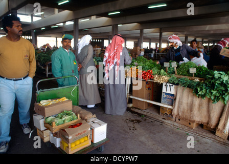 Kuwait City Kuwait People At Iranian Vegetable Market With Foreign Worker Stock Photo