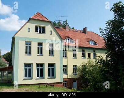 The 'Haus Fichtengrund' on today's grounds of the Stephanus foundation is pictured in Templin, Germany, 22 August 2013. German chancellor Angela Merkel lived in the apartment on the second floor with her mother and her father, called Kasner. Photo: PATRICK PLEUL Stock Photo